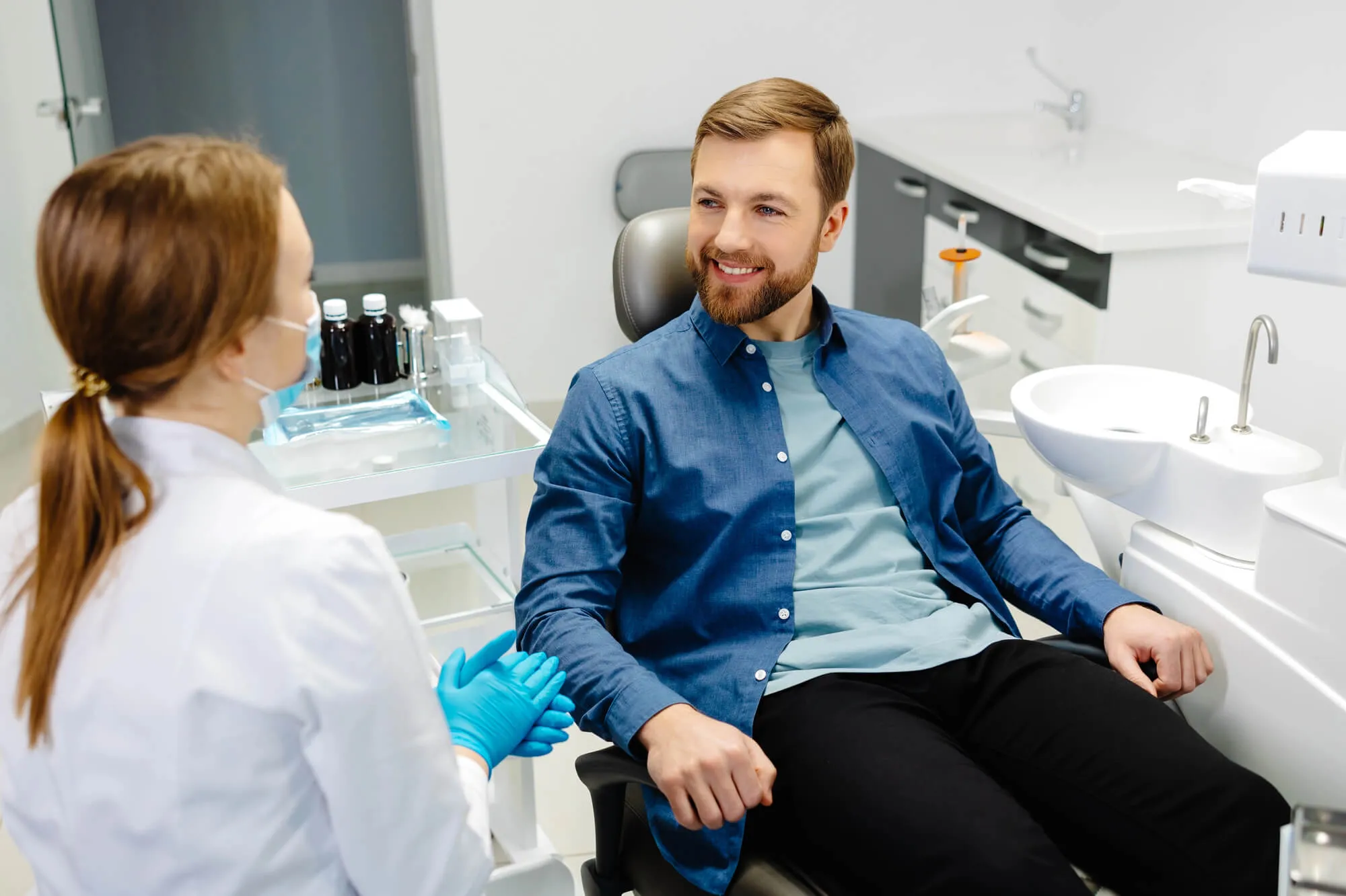 Holistic dentist in Maryland talking to patient