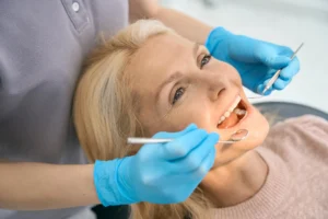 senior having her Dental implants Montgomery County checked