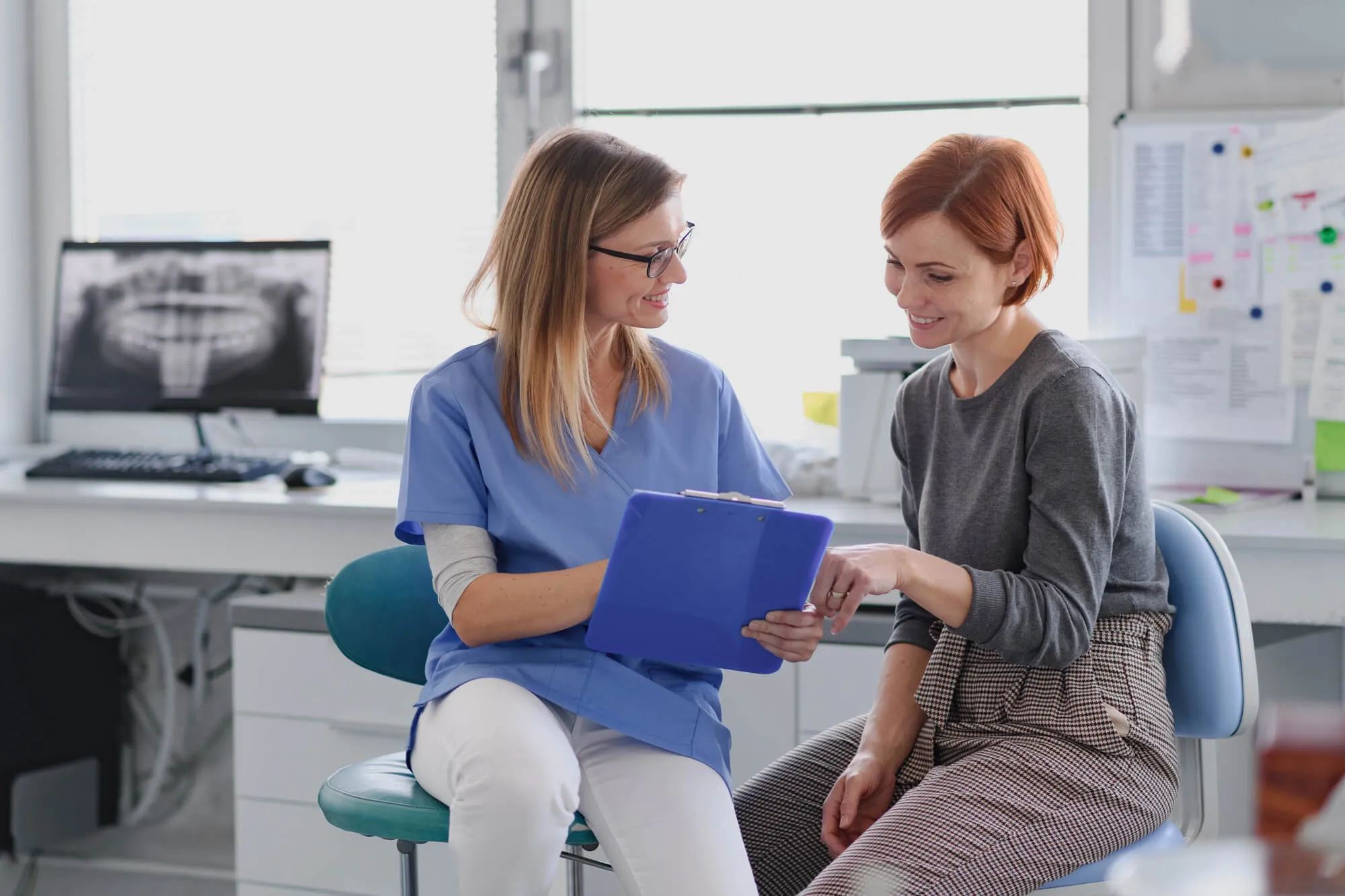 discussing the Cost of dental implants maryland