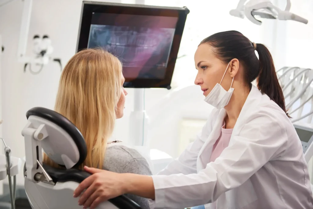 dentist explaining Ozone dental treatment to patient