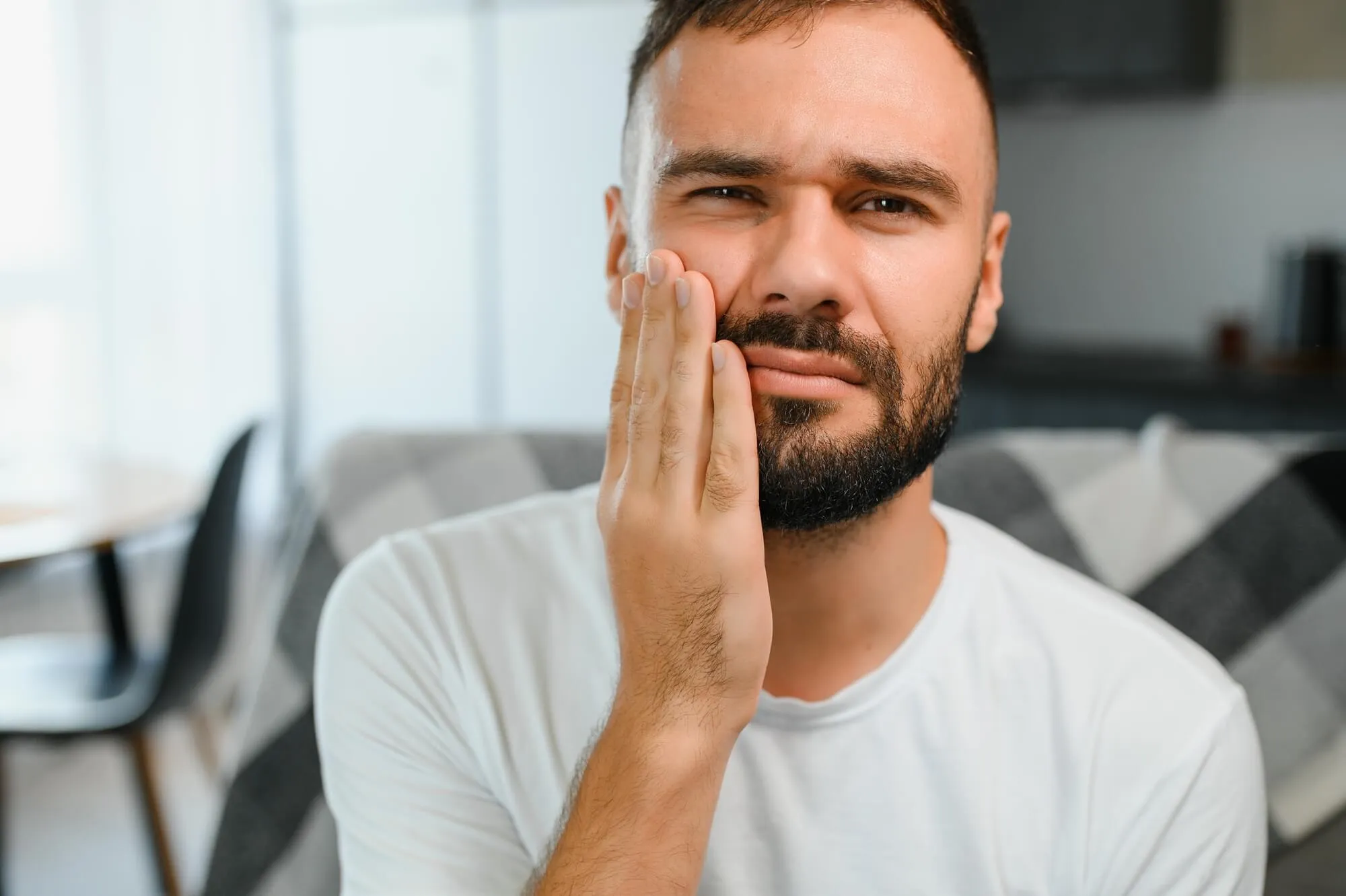 man needs an Emergency biological dentist